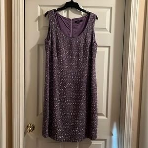 Sheath, sleeveless dress with long sleeved matching jacket. Fully lined.